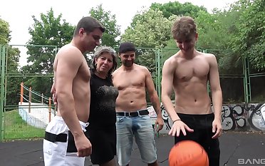 Amateur granny gets fucked in gangbang on the basketball court